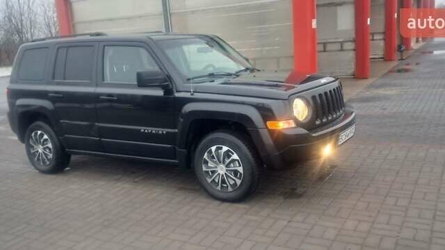 Чорний Джип Patriot, об'ємом двигуна 2.36 л та пробігом 290 тис. км за 6450 $, фото 21 на Automoto.ua