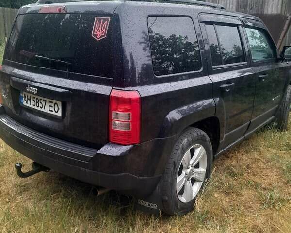 Черный Джип Патриот, объемом двигателя 2.4 л и пробегом 260 тыс. км за 8700 $, фото 4 на Automoto.ua