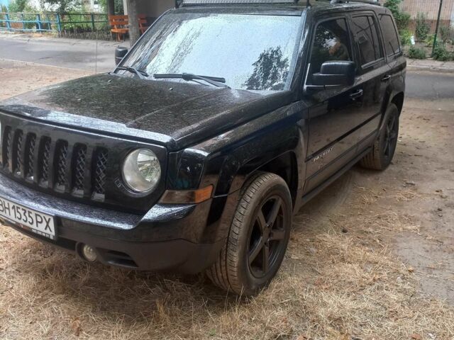 Чорний Джип Patriot, об'ємом двигуна 2.4 л та пробігом 200 тис. км за 9500 $, фото 1 на Automoto.ua