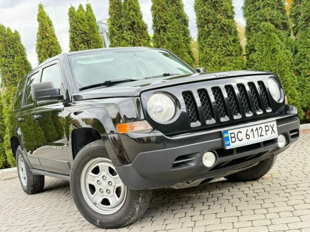 Черный Джип Патриот, объемом двигателя 2.4 л и пробегом 195 тыс. км за 7999 $, фото 1 на Automoto.ua