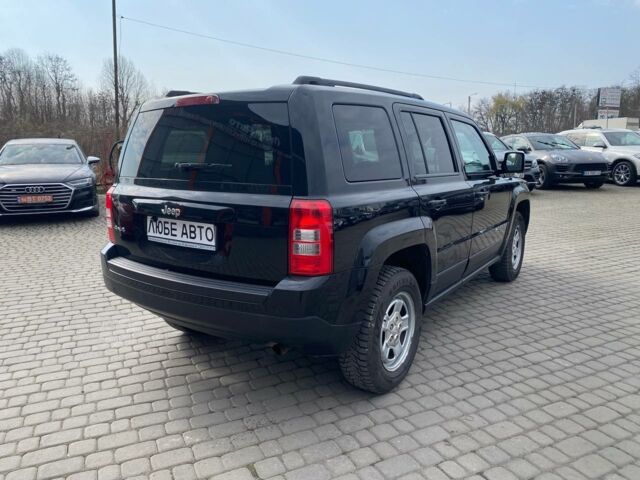 Черный Джип Патриот, объемом двигателя 2.4 л и пробегом 310 тыс. км за 8800 $, фото 6 на Automoto.ua
