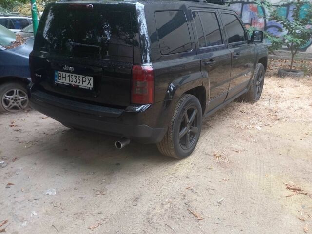 Чорний Джип Patriot, об'ємом двигуна 2.4 л та пробігом 200 тис. км за 9500 $, фото 3 на Automoto.ua