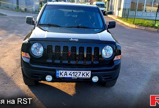 Чорний Джип Patriot, об'ємом двигуна 2 л та пробігом 220 тис. км за 10800 $, фото 1 на Automoto.ua