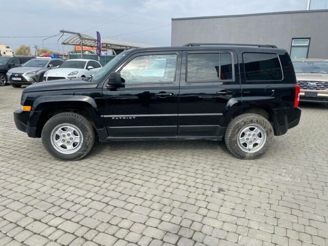 Черный Джип Патриот, объемом двигателя 2.4 л и пробегом 310 тыс. км за 8800 $, фото 3 на Automoto.ua