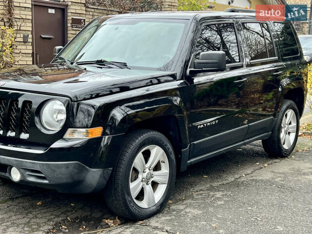 Чорний Джип Patriot, об'ємом двигуна 2.36 л та пробігом 170 тис. км за 9200 $, фото 6 на Automoto.ua