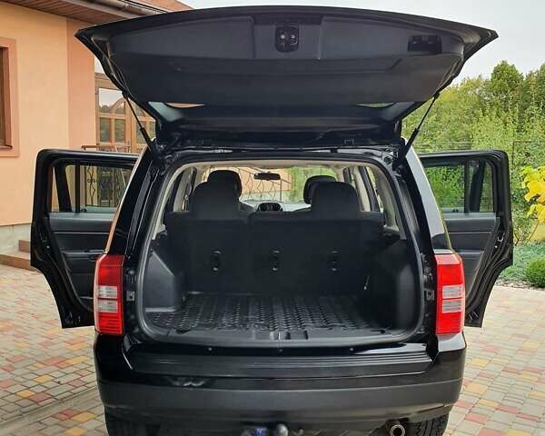 Черный Джип Патриот, объемом двигателя 2.36 л и пробегом 155 тыс. км за 10500 $, фото 8 на Automoto.ua