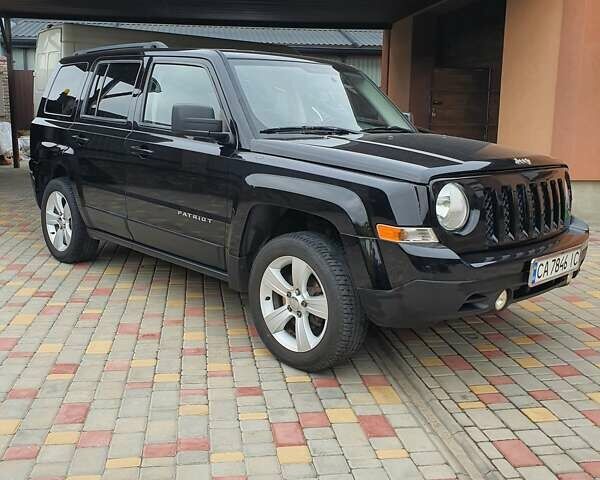 Черный Джип Патриот, объемом двигателя 2.36 л и пробегом 155 тыс. км за 10500 $, фото 2 на Automoto.ua