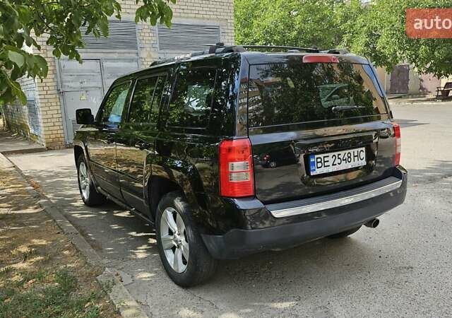 Черный Джип Патриот, объемом двигателя 2.36 л и пробегом 250 тыс. км за 9000 $, фото 4 на Automoto.ua