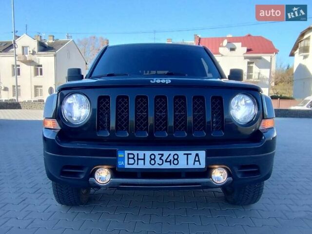 Черный Джип Патриот, объемом двигателя 2.36 л и пробегом 220 тыс. км за 12000 $, фото 4 на Automoto.ua