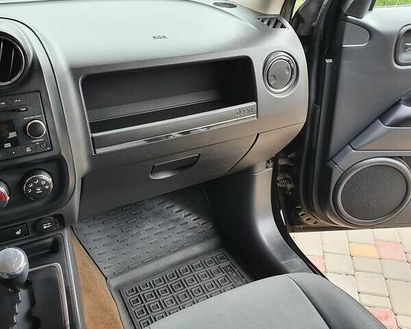 Черный Джип Патриот, объемом двигателя 2.36 л и пробегом 155 тыс. км за 10500 $, фото 9 на Automoto.ua