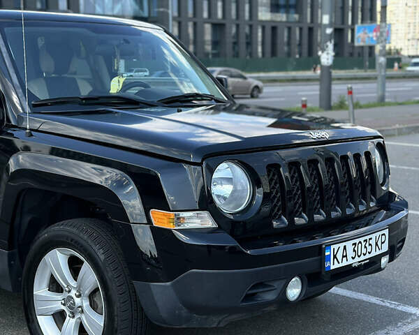Черный Джип Патриот, объемом двигателя 2.4 л и пробегом 180 тыс. км за 10500 $, фото 1 на Automoto.ua