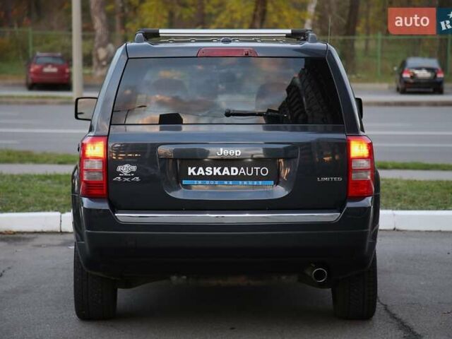 Черный Джип Патриот, объемом двигателя 2.36 л и пробегом 230 тыс. км за 9600 $, фото 4 на Automoto.ua