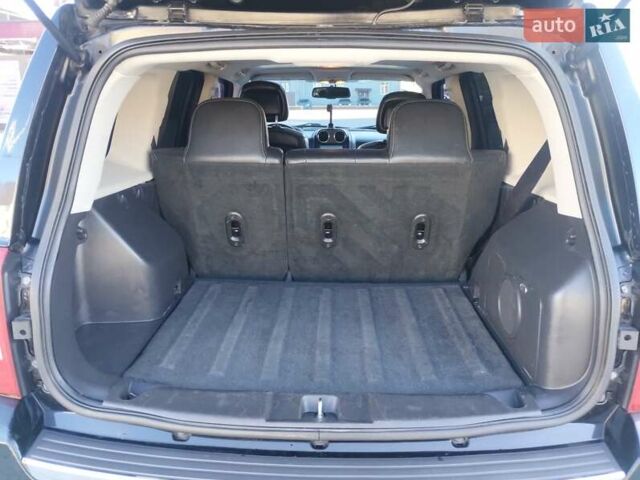 Черный Джип Патриот, объемом двигателя 2.36 л и пробегом 220 тыс. км за 12000 $, фото 20 на Automoto.ua