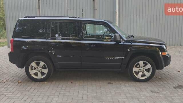 Черный Джип Патриот, объемом двигателя 2.36 л и пробегом 181 тыс. км за 9999 $, фото 2 на Automoto.ua