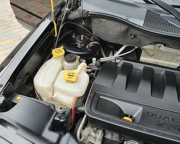 Черный Джип Патриот, объемом двигателя 2.36 л и пробегом 155 тыс. км за 10500 $, фото 4 на Automoto.ua