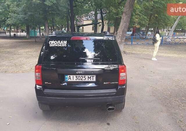 Черный Джип Патриот, объемом двигателя 2 л и пробегом 150 тыс. км за 9500 $, фото 2 на Automoto.ua