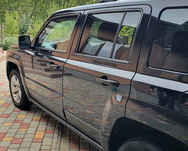 Черный Джип Патриот, объемом двигателя 2.36 л и пробегом 155 тыс. км за 10500 $, фото 20 на Automoto.ua