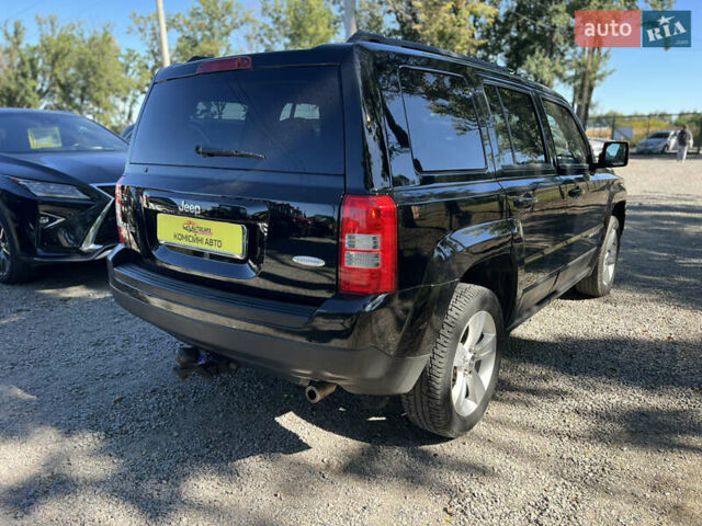Чорний Джип Patriot, об'ємом двигуна 2.4 л та пробігом 155 тис. км за 11300 $, фото 3 на Automoto.ua
