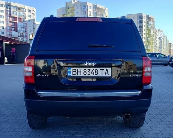 Черный Джип Патриот, объемом двигателя 2.36 л и пробегом 220 тыс. км за 12000 $, фото 5 на Automoto.ua