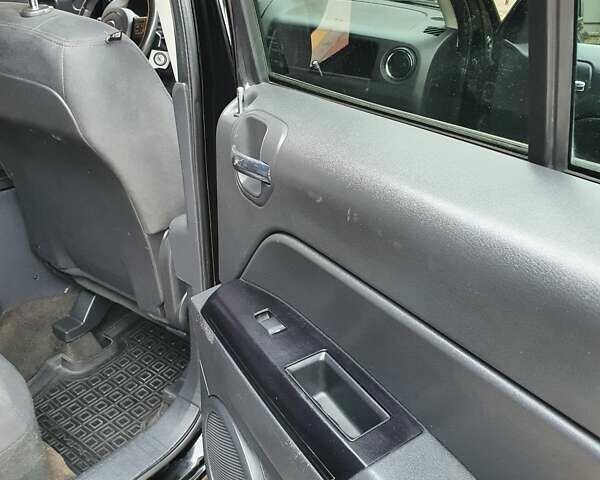 Черный Джип Патриот, объемом двигателя 2.36 л и пробегом 155 тыс. км за 10500 $, фото 13 на Automoto.ua