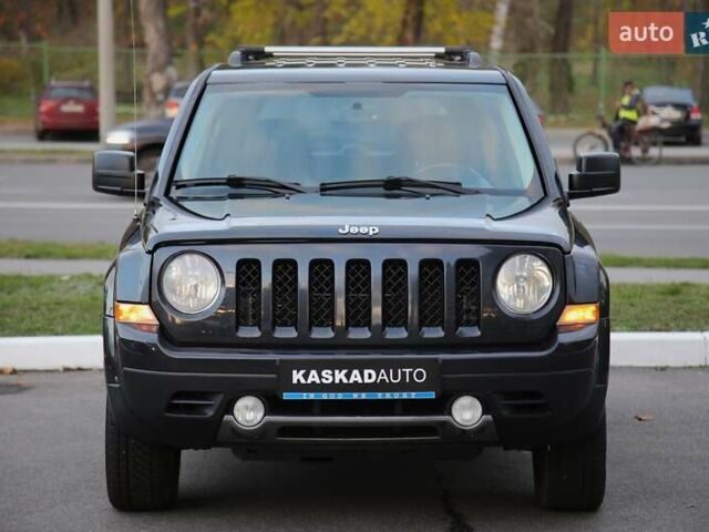 Черный Джип Патриот, объемом двигателя 2.36 л и пробегом 230 тыс. км за 9600 $, фото 1 на Automoto.ua