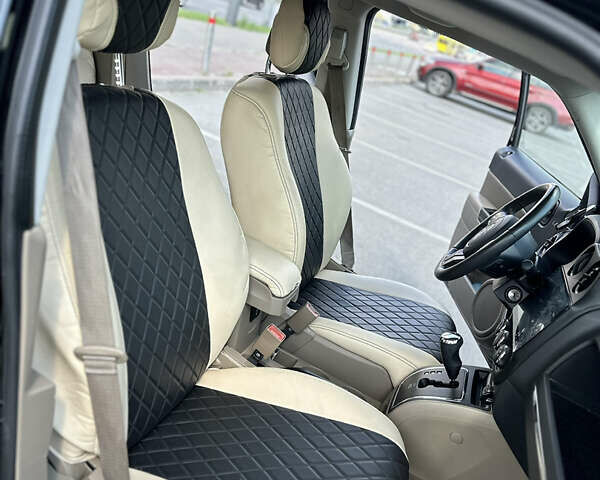 Черный Джип Патриот, объемом двигателя 2.4 л и пробегом 180 тыс. км за 10500 $, фото 16 на Automoto.ua