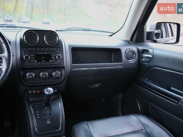 Черный Джип Патриот, объемом двигателя 2.36 л и пробегом 230 тыс. км за 9600 $, фото 12 на Automoto.ua