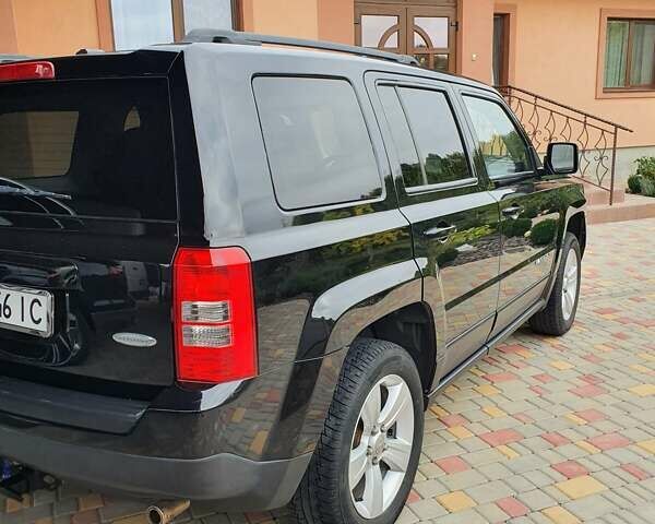 Черный Джип Патриот, объемом двигателя 2.36 л и пробегом 155 тыс. км за 10500 $, фото 19 на Automoto.ua