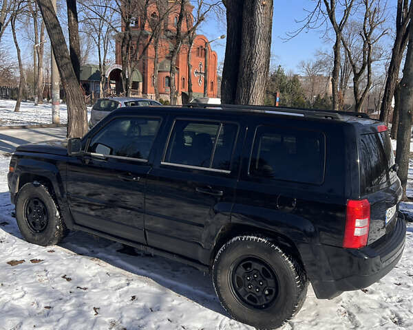 Чорний Джип Patriot, об'ємом двигуна 2.36 л та пробігом 190 тис. км за 8650 $, фото 7 на Automoto.ua