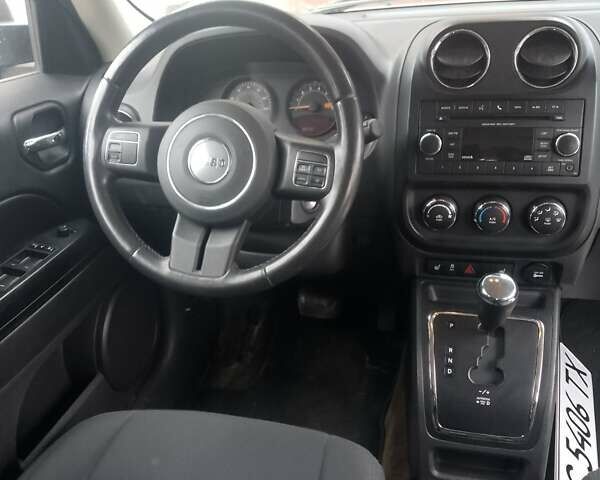 Чорний Джип Patriot, об'ємом двигуна 2.4 л та пробігом 285 тис. км за 8000 $, фото 1 на Automoto.ua