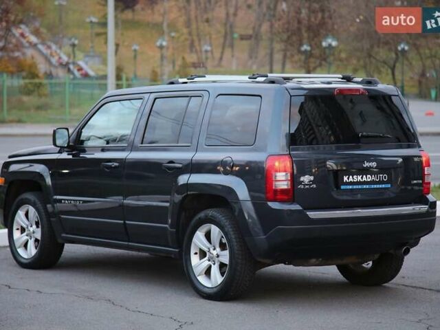 Черный Джип Патриот, объемом двигателя 2.36 л и пробегом 230 тыс. км за 9600 $, фото 3 на Automoto.ua