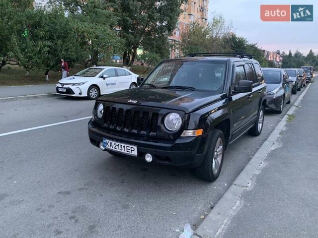 Черный Джип Патриот, объемом двигателя 2.36 л и пробегом 170 тыс. км за 8000 $, фото 1 на Automoto.ua