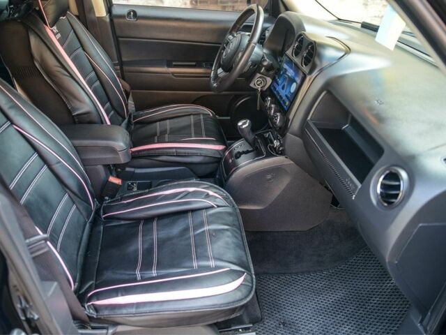 Черный Джип Патриот, объемом двигателя 2.4 л и пробегом 102 тыс. км за 10800 $, фото 6 на Automoto.ua