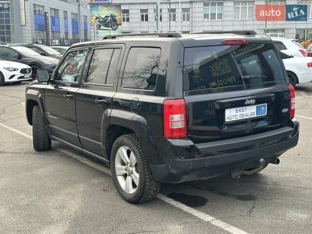 Черный Джип Патриот, объемом двигателя 2.36 л и пробегом 156 тыс. км за 9490 $, фото 6 на Automoto.ua