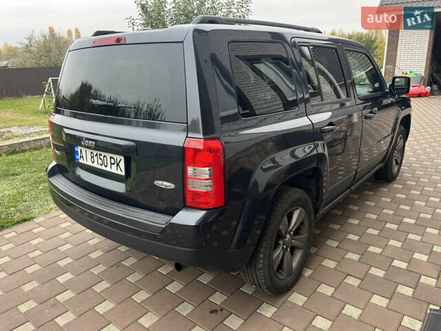 Джип Патриот 2014 в Борисполе на Automoto.ua Черный Джип Патриот, объемом двигателя 2.36 л и пробегом 80 тыс. км за 10500 $, фото 7 на Automoto.ua