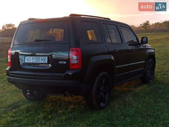 Черный Джип Патриот, объемом двигателя 2 л и пробегом 135 тыс. км за 9900 $, фото 3 на Automoto.ua
