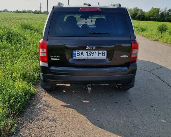 Черный Джип Патриот, объемом двигателя 2.4 л и пробегом 154 тыс. км за 11100 $, фото 8 на Automoto.ua
