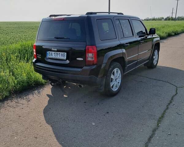 Черный Джип Патриот, объемом двигателя 2.4 л и пробегом 154 тыс. км за 11100 $, фото 7 на Automoto.ua