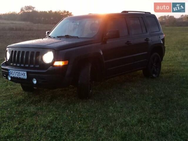 Черный Джип Патриот, объемом двигателя 2 л и пробегом 135 тыс. км за 9900 $, фото 1 на Automoto.ua