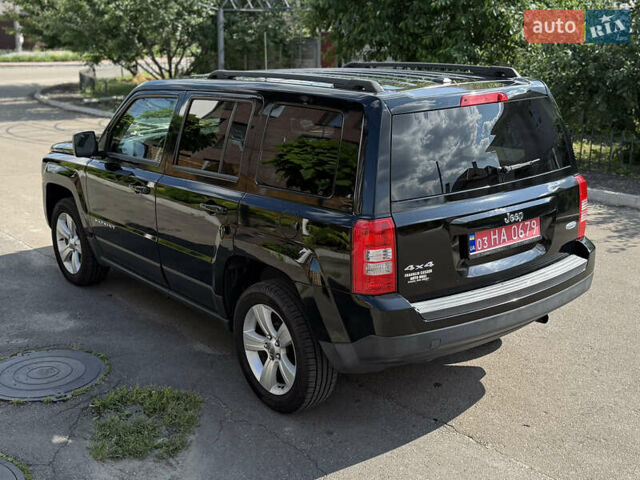 Чорний Джип Patriot, об'ємом двигуна 2.36 л та пробігом 200 тис. км за 10600 $, фото 9 на Automoto.ua