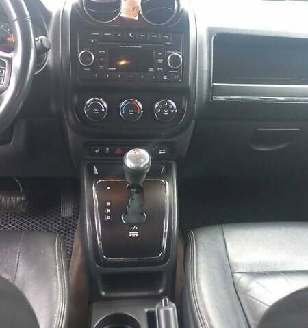 Черный Джип Патриот, объемом двигателя 2.36 л и пробегом 180 тыс. км за 9700 $, фото 4 на Automoto.ua