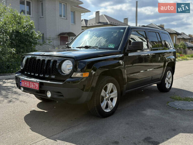 Чорний Джип Patriot, об'ємом двигуна 2.36 л та пробігом 200 тис. км за 10600 $, фото 4 на Automoto.ua