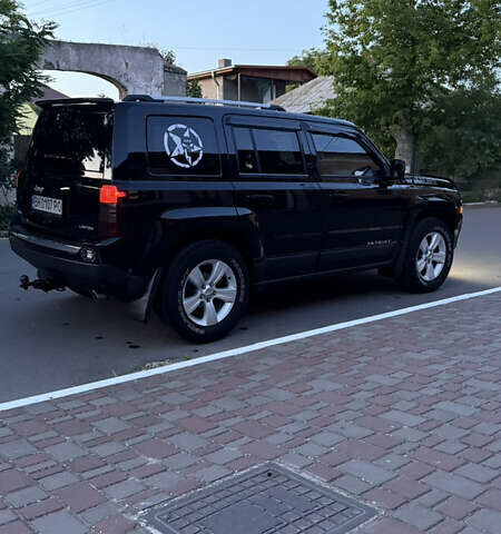 Черный Джип Патриот, объемом двигателя 2.4 л и пробегом 84 тыс. км за 15000 $, фото 9 на Automoto.ua