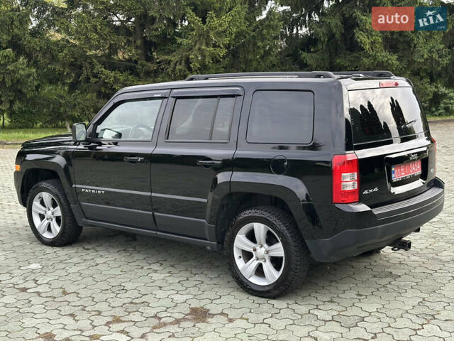 Джип Патриот 2014 в Дубно на Automoto.ua Черный Джип Патриот, объемом двигателя 2.4 л и пробегом 236 тыс. км за 8800 $, фото 35 на Automoto.ua