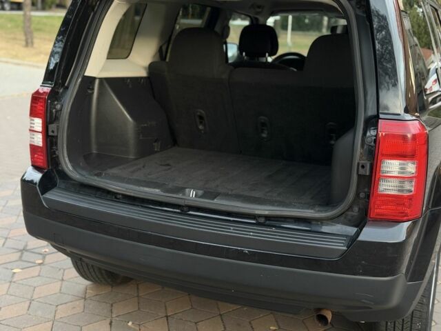 Джип Патриот 2014 в Лубнах на Automoto.ua Черный Джип Патриот, объемом двигателя 2.4 л и пробегом 197 тыс. км за 9999 $, фото 16 на Automoto.ua