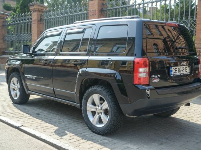 Черный Джип Патриот, объемом двигателя 2.4 л и пробегом 102 тыс. км за 10800 $, фото 2 на Automoto.ua