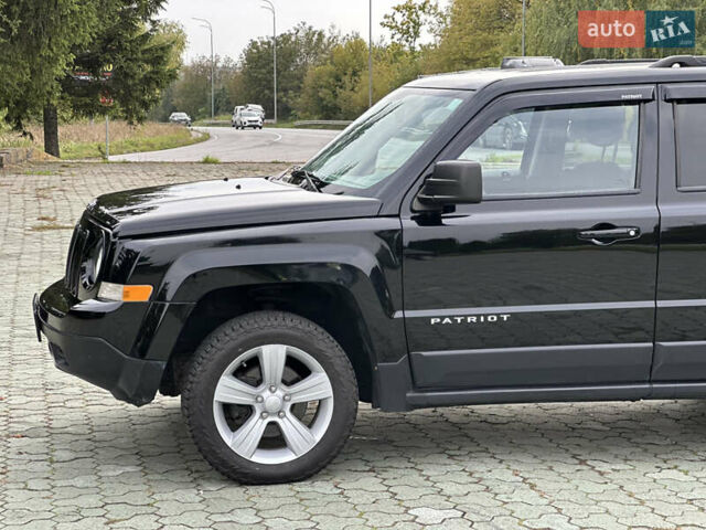 Джип Патриот 2014 в Дубно на Automoto.ua Черный Джип Патриот, объемом двигателя 2.4 л и пробегом 236 тыс. км за 8800 $, фото 13 на Automoto.ua