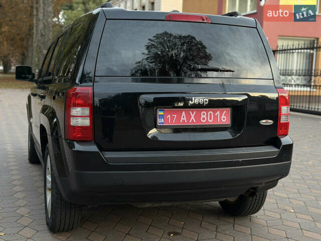 Черный Джип Патриот, объемом двигателя 2.4 л и пробегом 197 тыс. км за 9999 $, фото 60 на Automoto.ua