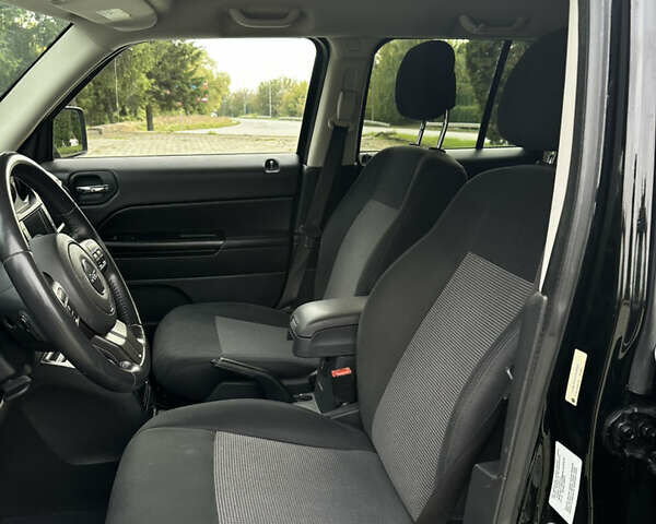 Джип Патриот 2014 в Дубно на Automoto.ua Черный Джип Патриот, объемом двигателя 2.4 л и пробегом 236 тыс. км за 8800 $, фото 17 на Automoto.ua