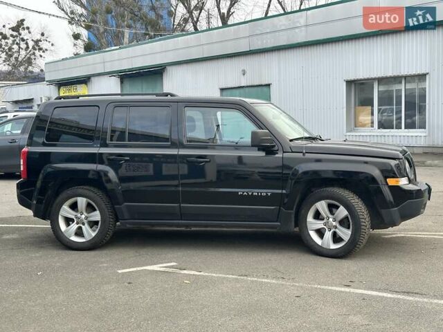 Черный Джип Патриот, объемом двигателя 2.36 л и пробегом 156 тыс. км за 9490 $, фото 4 на Automoto.ua